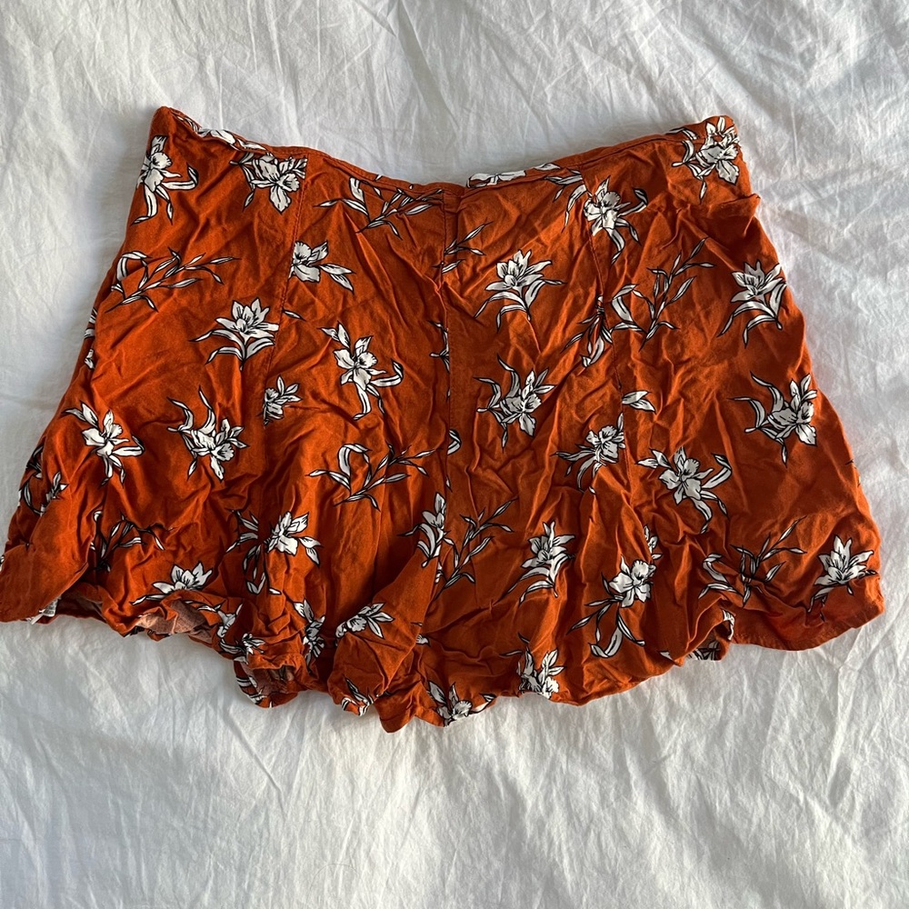 Forever 21 orange flowy shorts with white floral print size L